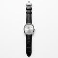 Universe Point silver dial luxury watch with black leather strap